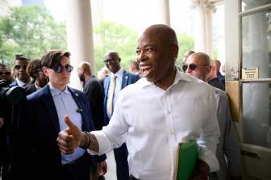 Mayor Eric Adams smiling at campaign announcement
