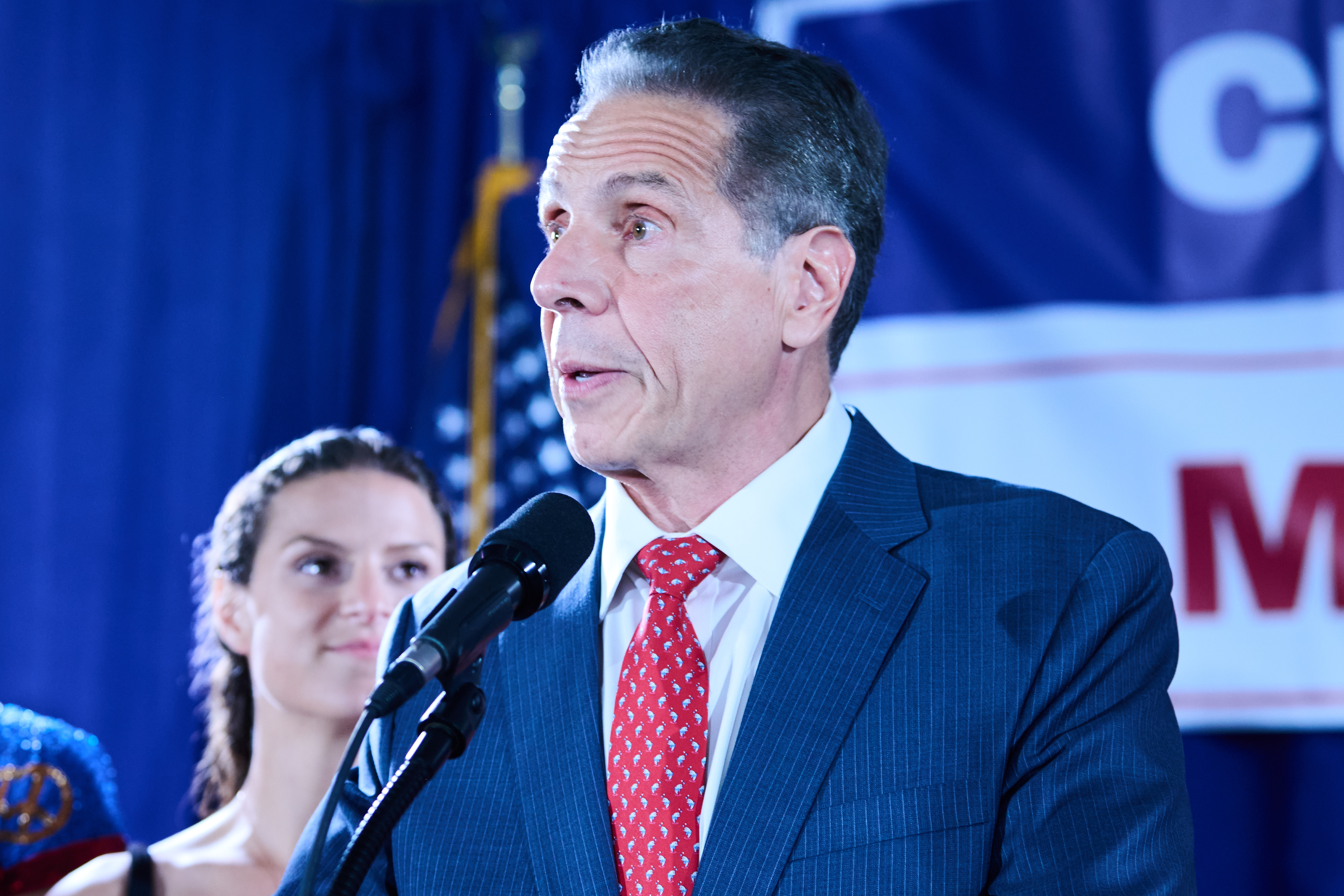 NYC Mayor's Race: How each candidate plans to approach policing and crime 3 man at Cuomo campaign rally speaking with suit and tie on