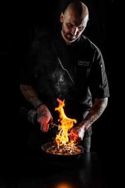 BarChef NYC: Where cocktails wear couture and chemistry is served with a smirk 37 Bartender working with flames to make unique cocktail