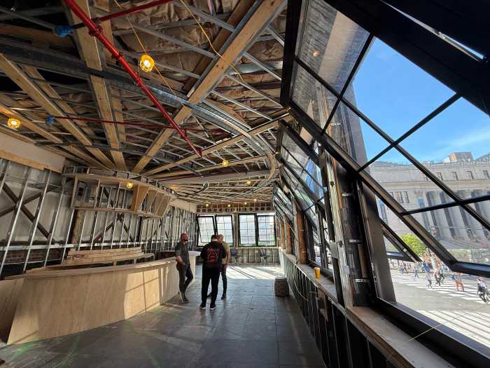 The venue’s large front-facing windows offer direct views of the Garden.