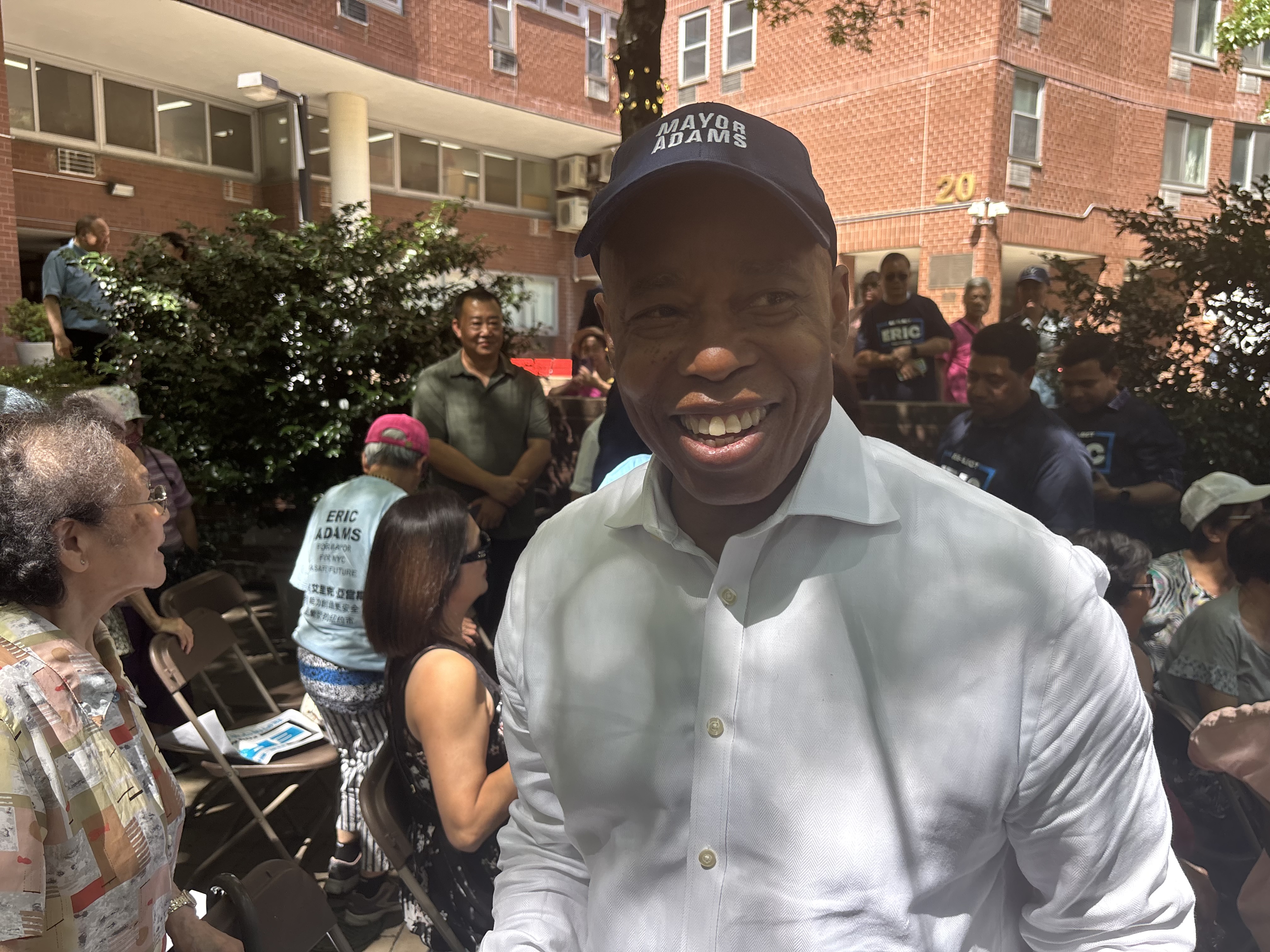 'AAPI for Mayor Adams': Adams campaigns in Chinatown, earns support from local leaders 2 Eric Adams, smiling, wears a hat reading "Mayor Adams."