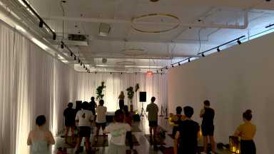 When weed meets wellness: a look inside HighYoga’s mindful movement classes  8 People in a yoga class standing