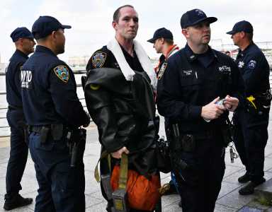 Hudson River rescue: NYPD and FDNY units pull two men from water, looking for missing woman 23 First responders in uniform and wet after Hudson River water rescue