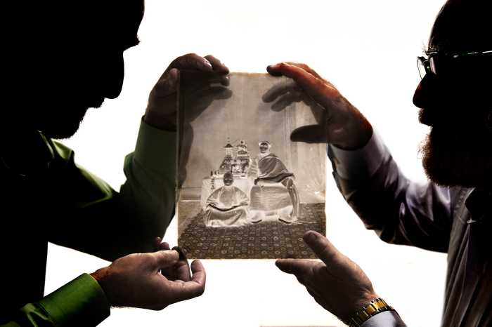 This Flatiron District shop preserves photography you won't find on a phone or Instagram 8 two men in Flatiron District holding up glass negative photography