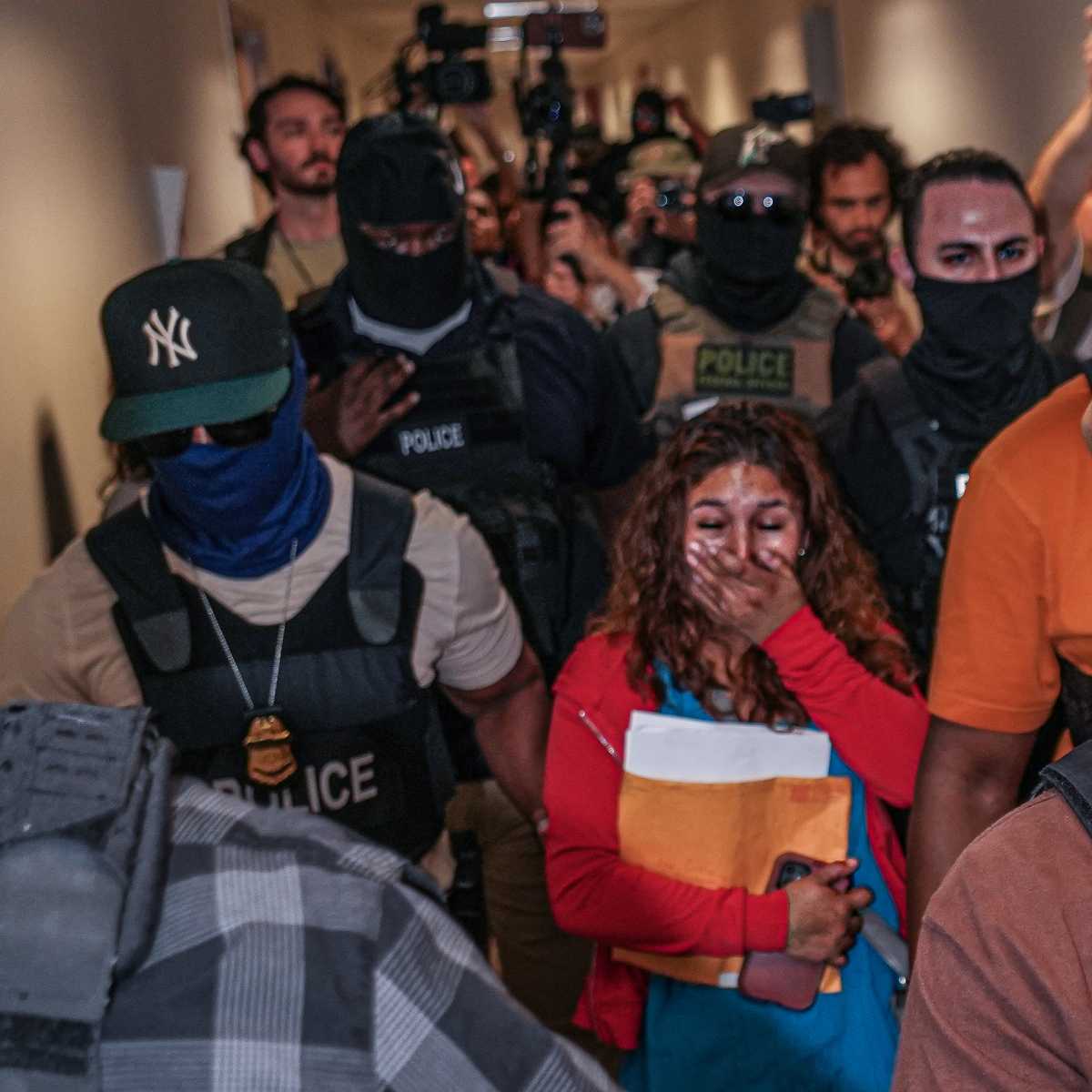 ICE in courts: More immigrants cuffed in Lower Manhattan as legal groups look to preserve and expand New York’s immigration protections 1 woman in tears as ICE agents arrest and escort her in hallway