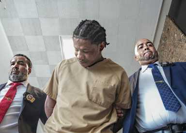 suspect accused of shooting border patrol agent bows before camera