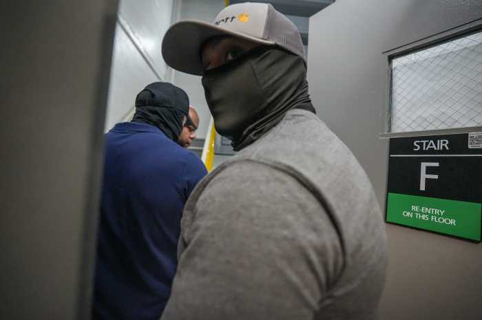 Masked men and ICE agents in immigration court in Lower Manhattan