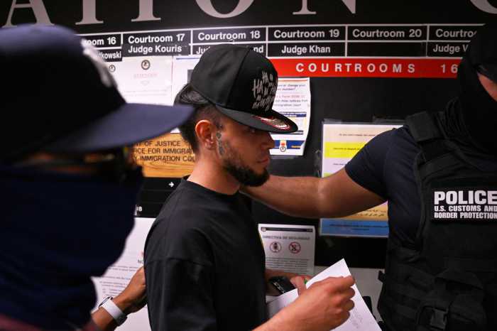 ICE in Courts: Reverend joins protest after congregant detained inside Federal Plaza 2 ICE Agents take a man into custody on August 1st.