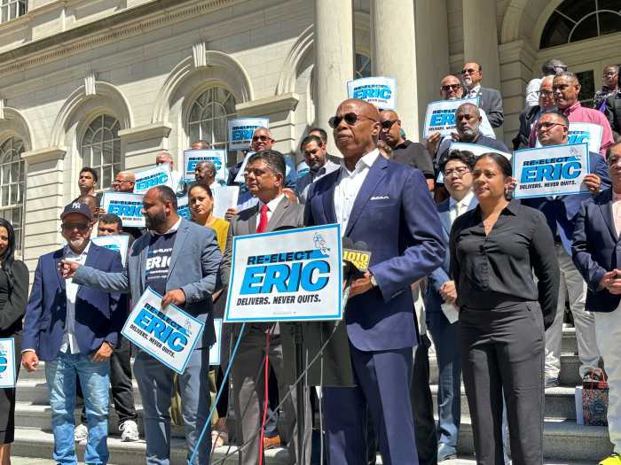 NYC Mayor's Race: Is recently 5-time indicted ex-Adams aide still volunteering on his reelection bid? He won't say 5 Mayor Adams in sunglasses on steps of city hall with business owners
