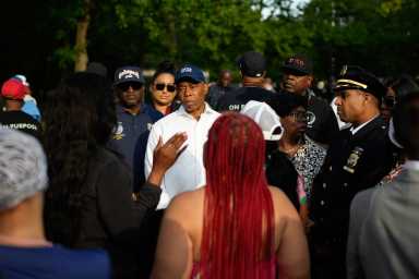 Mayor Adams pledges more cops and violence interrupters amid uptick in Bronx shootings 4 Mayor Eric Adams speaking with people in the Bronx after rash of shootings