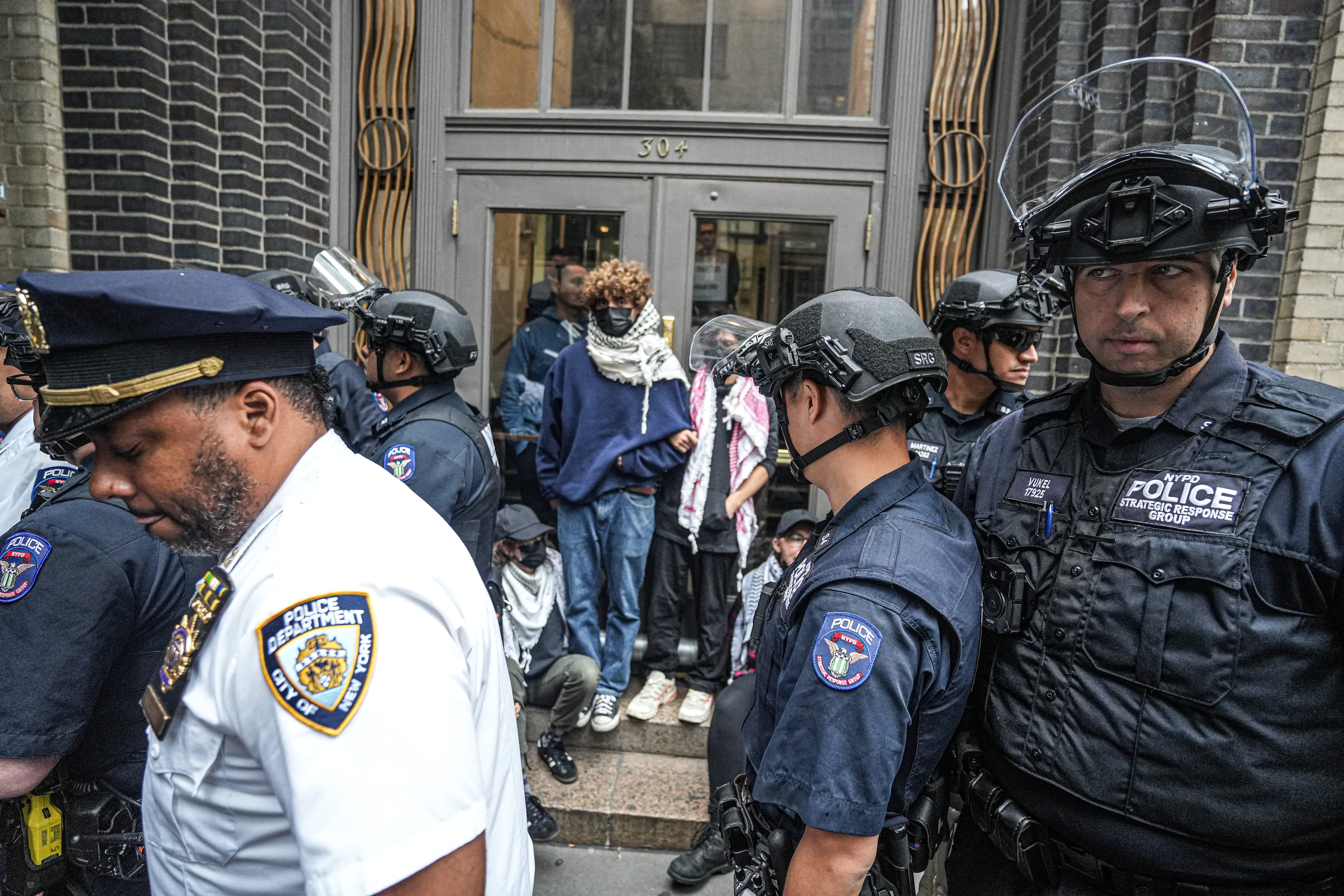 NYPD in the SRG unit arrest protesters in Midtown.