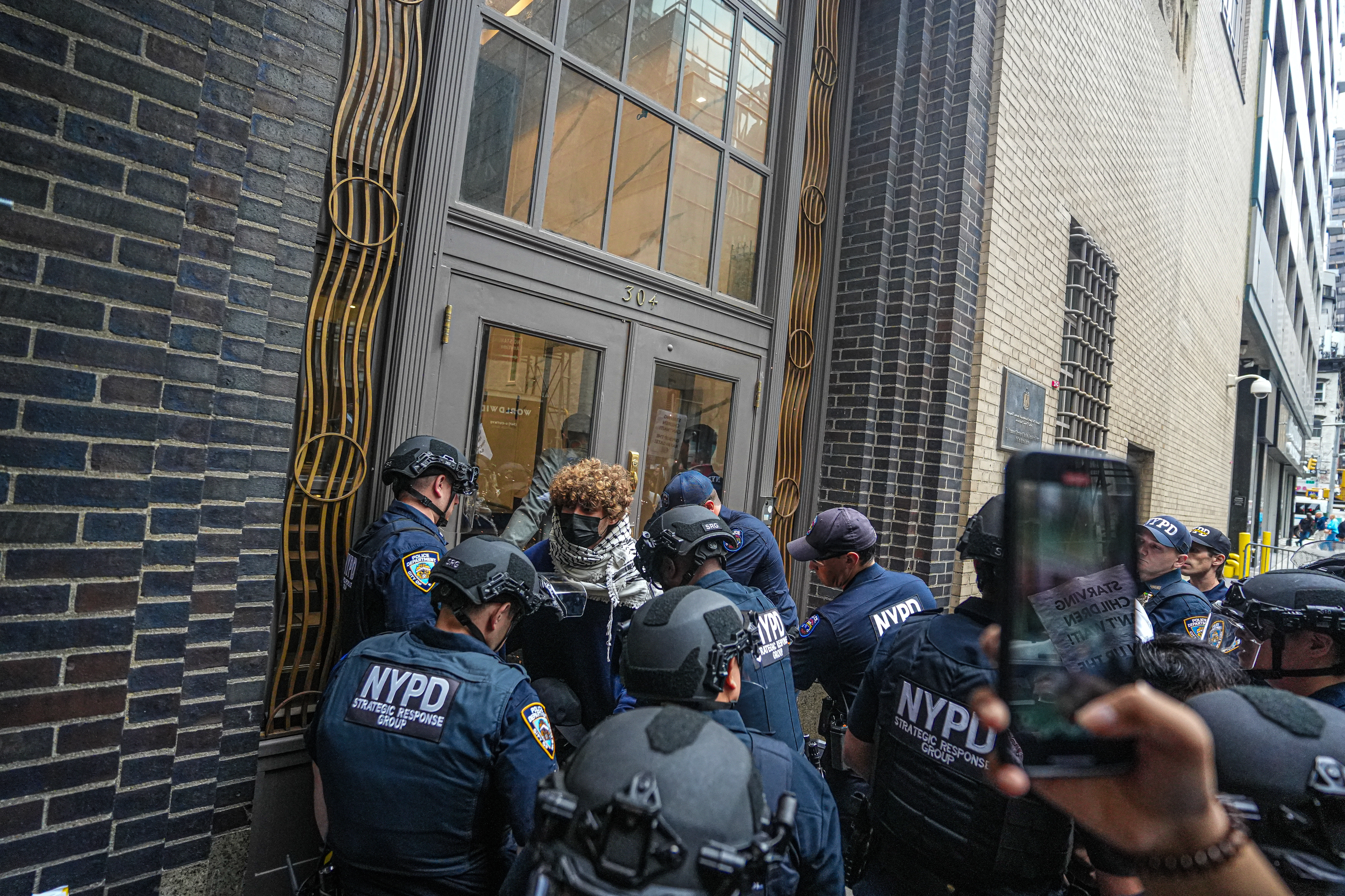 NYPD in the SRG unit arrest protesters in Midtown.