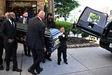 Brooklyn security guard killed in Midtown mass shooting laid to rest as a hometown hero 17 child and pallbearers carry casket of Midtown mass shooting victim